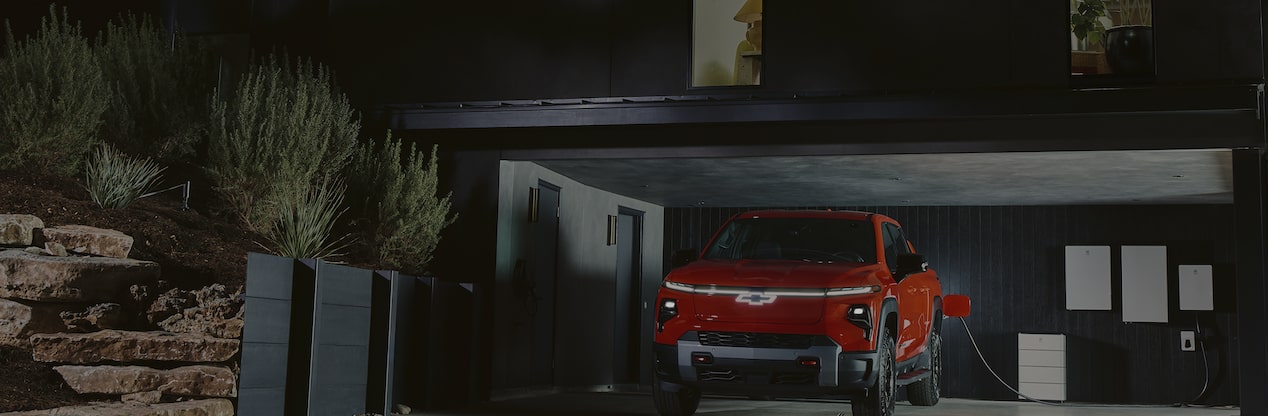 Red Cadillac in garage with GM Energy Home System