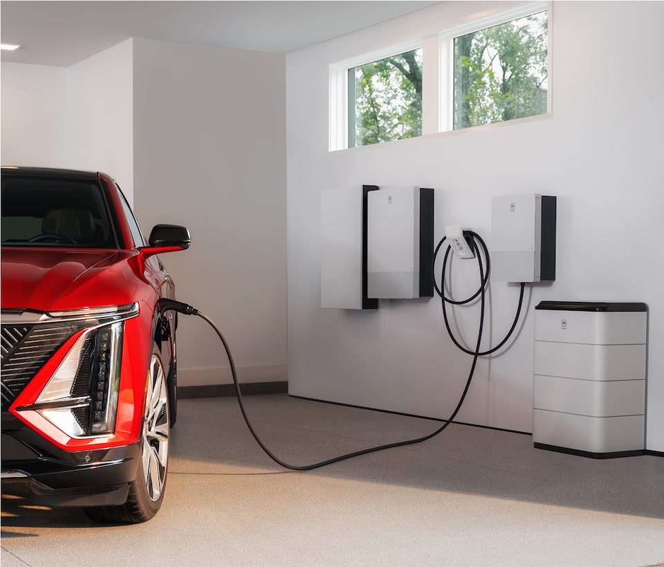 red car charging in garage