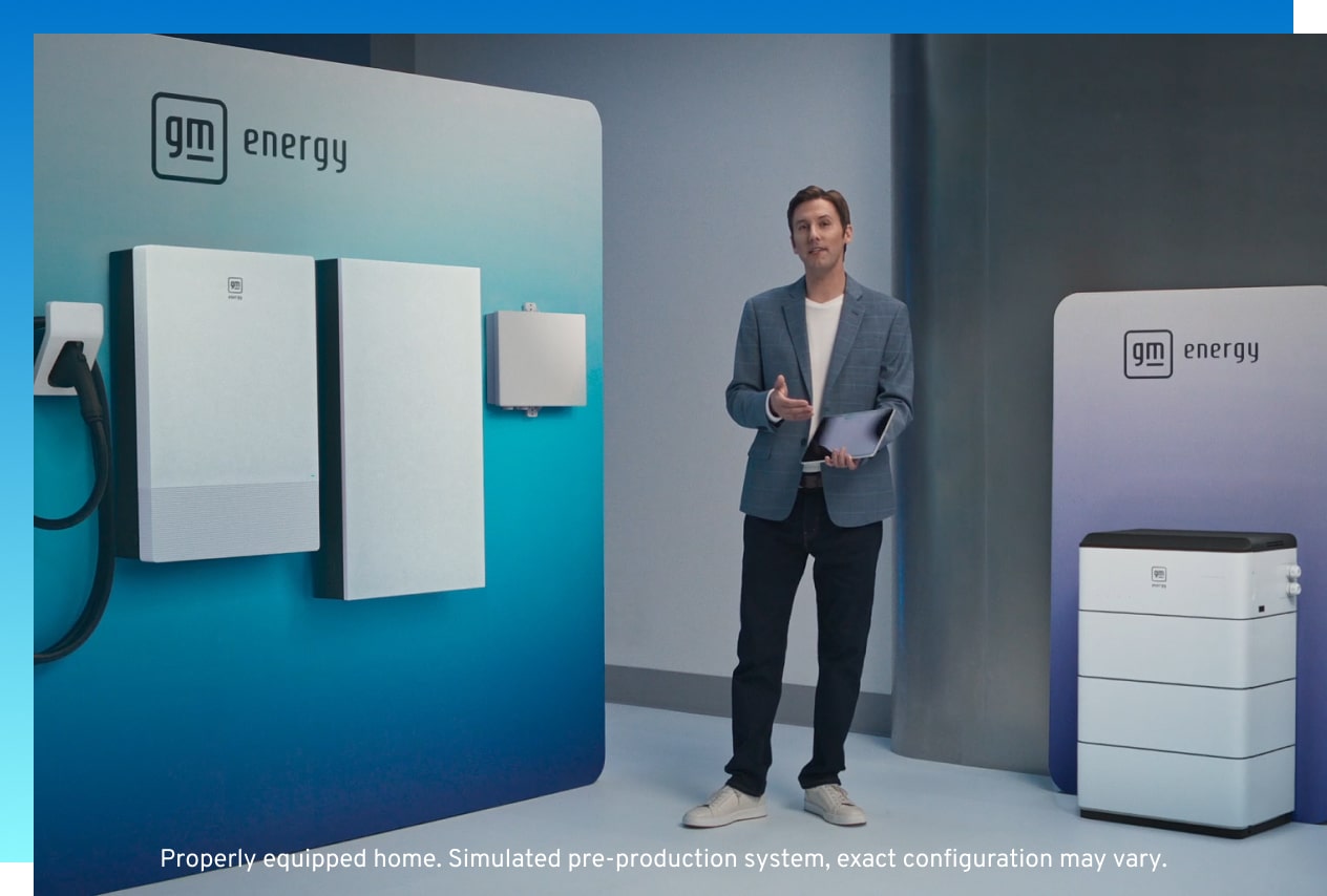 Man standing in front of a suite of GM Energy products