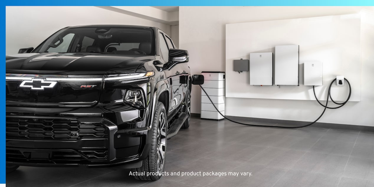 Black EV plugged into wall charging station