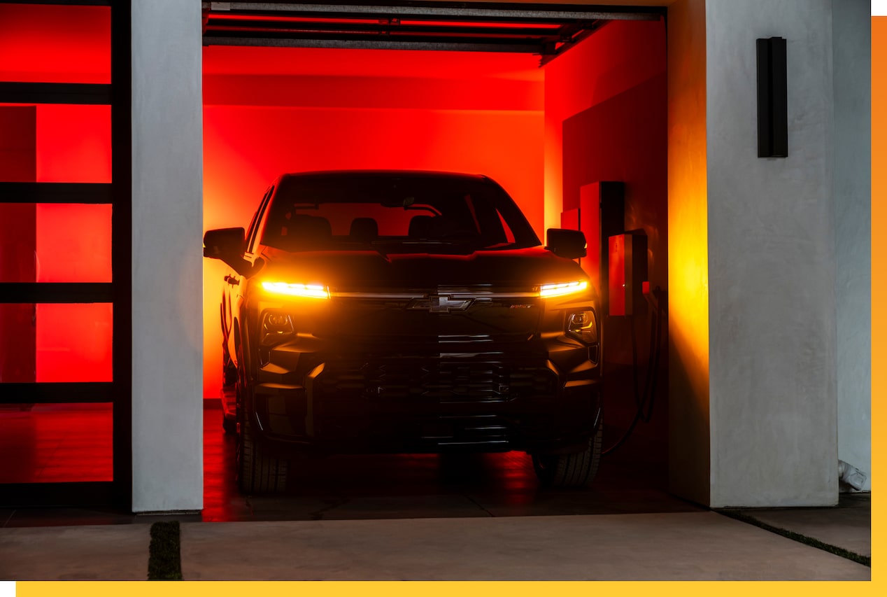 Black Chevy EV in Garage