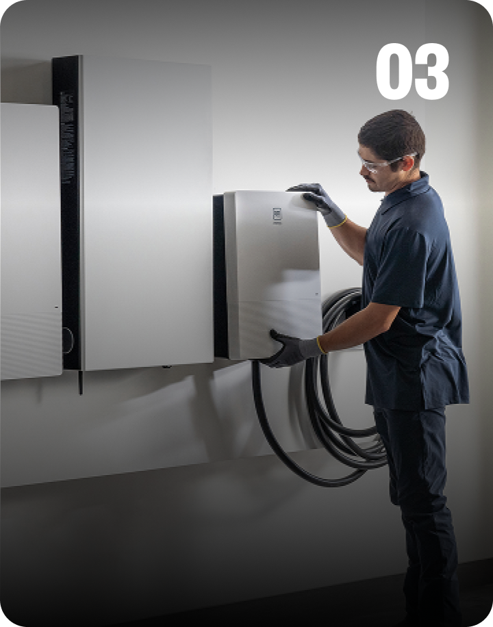 Installer installing GM Energy equipment