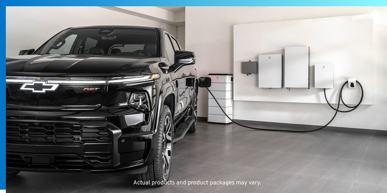 Black EV plugged into wall charging station