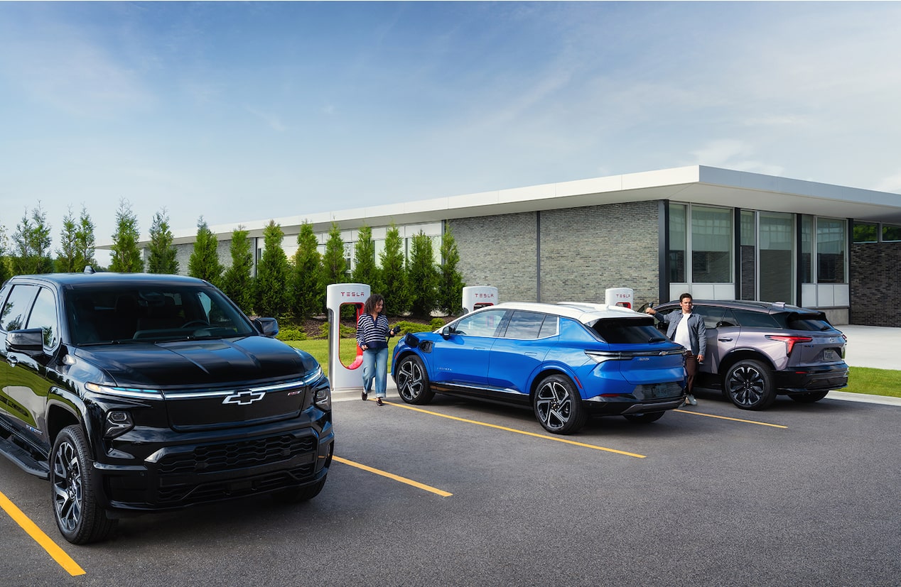Three cars at charging station