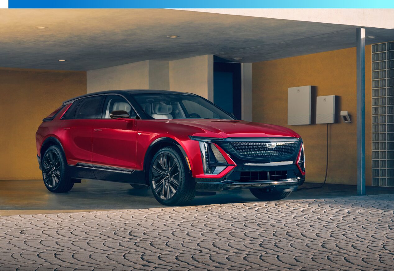 Cadillac LYRIQ EV charging in a garage