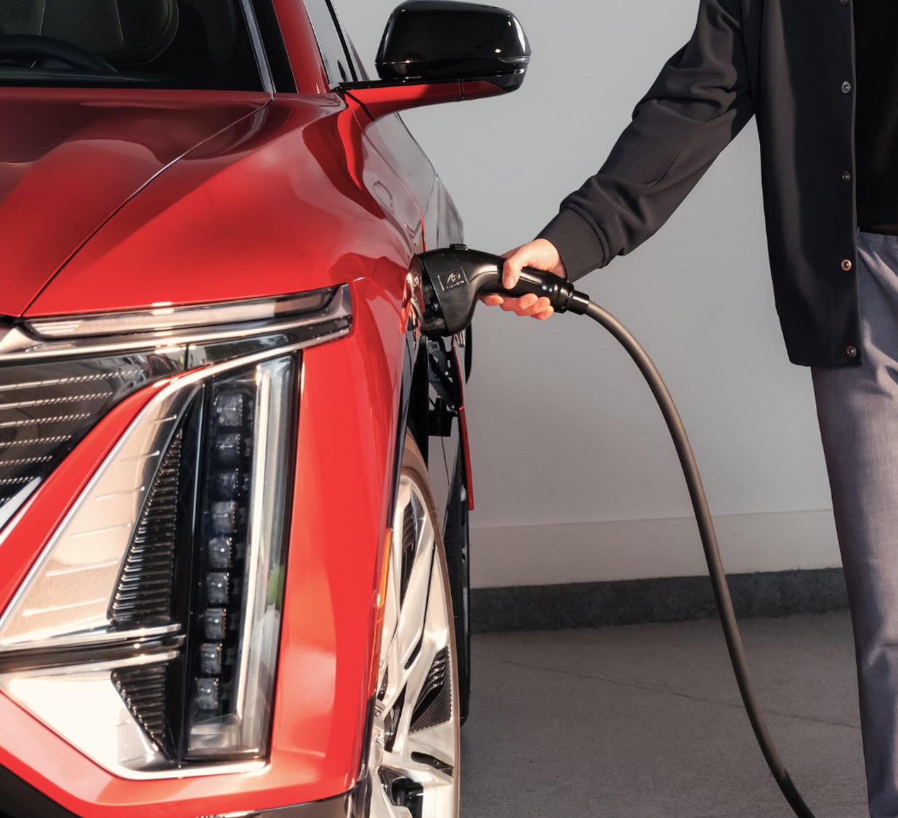 GM Energy PowerShift Charger plugged into EV