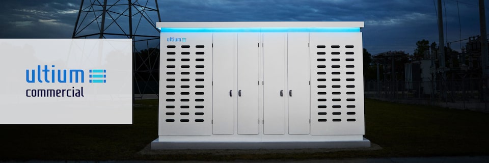 Close-up of an Ultium Commercial product at night with a blue glow, and the Ultium Commercial logo over the left side of the image.