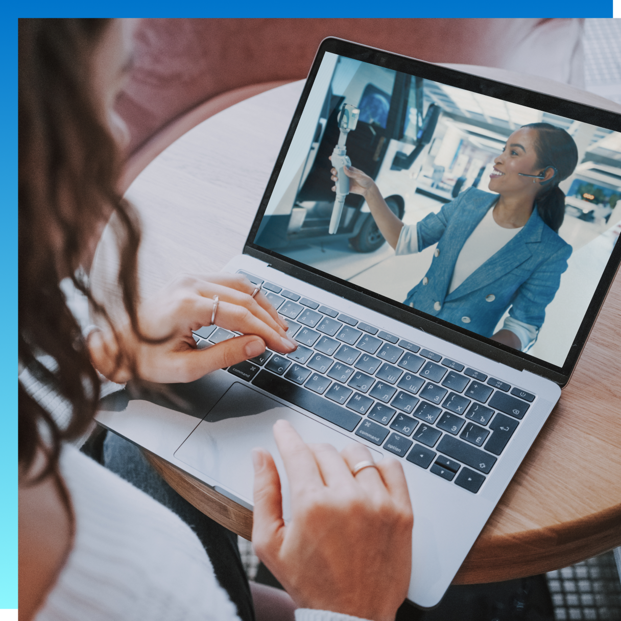 Person watching a demo of GM energy on laptop